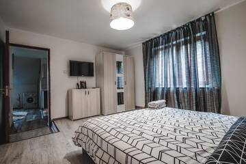 Фото номера Вилла с 3 спальнями Виллы Casa de Vacanta Cris г. Бэи­ле-Олэ­неш­ти 24